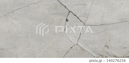 Abstract cracked concrete wall texture with structural fracture pattern 140276256