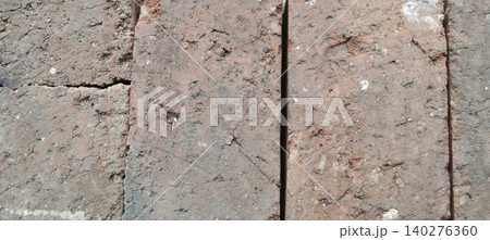 Rustic red brick wall texture with weathered surface Rustic red brick wall texture with weathered surface 140276360