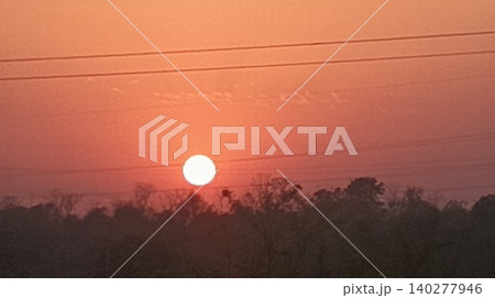 sunset at the mountain with the silhouette of a tree sunset at the mountain with the silhouette of a tree 140277946