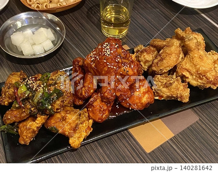 Crispy fried chicken with golden, crunchy skin and juicy, tender meat. A delicious and savory dish, perfect for any meal, served with dipping sauces or side dishes for extra flavor! Crispy fried chicken with golden, crunchy skin and juicy, tender meat. A delicious and savory dish, perfect for any meal, served with dipping sauces or side dishes for extra flavor! 140281642