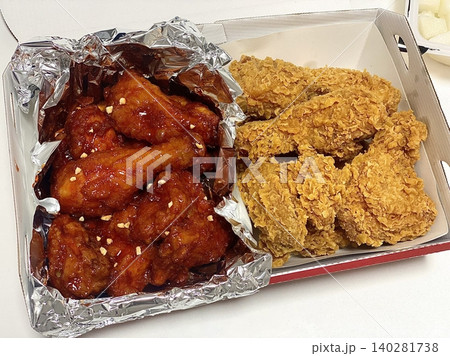 Crispy fried chicken with golden, crunchy skin and juicy, tender meat. A delicious and savory dish, perfect for any meal, served with dipping sauces or side dishes for extra flavor! 140281738
