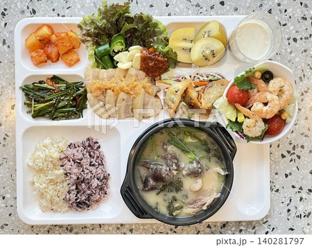 A vibrant spread of Korean food on the table, featuring various banchan (side dishes) like kimchi, pickled vegetables, and seasoned greens. Perfect for food photography, showcasing traditional Korean. A vibrant spread of Korean food on the table, featuring various banchan (side dishes) like kimchi, pickled vegetables, and seasoned greens. Perfect for food photography, showcasing traditional Korean. 140281797