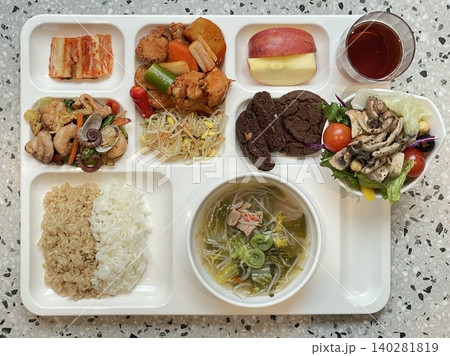 A vibrant spread of Korean food on the table, featuring various banchan (side dishes) like kimchi, pickled vegetables, and seasoned greens. Perfect for food photography, showcasing traditional Korean. A vibrant spread of Korean food on the table, featuring various banchan (side dishes) like kimchi, pickled vegetables, and seasoned greens. Perfect for food photography, showcasing traditional Korean. 140281819