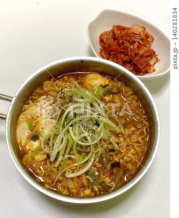 Shin Ramyun,close up of Ramyeon or Ramyun is a Korean-style soup noodle dish with a spicy flavor. Ramyeon or Korean instant noodles with egg - Korean food style Shin Ramyun,close up of Ramyeon or Ramyun is a Korean-style soup noodle dish with a spicy flavor. Ramyeon or Korean instant noodles with egg - Korean food style 140281834