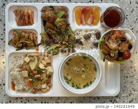 A vibrant spread of Korean food on the table, featuring various banchan (side dishes) like kimchi, pickled vegetables, and seasoned greens. Perfect for food photography, showcasing traditional Korean. A vibrant spread of Korean food on the table, featuring various banchan (side dishes) like kimchi, pickled vegetables, and seasoned greens. Perfect for food photography, showcasing traditional Korean. 140281849