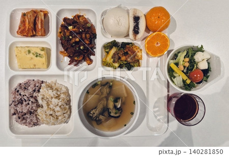 A vibrant spread of Korean food on the table, featuring various banchan (side dishes) like kimchi, pickled vegetables, and seasoned greens. Perfect for food photography, showcasing traditional Korean. A vibrant spread of Korean food on the table, featuring various banchan (side dishes) like kimchi, pickled vegetables, and seasoned greens. Perfect for food photography, showcasing traditional Korean. 140281850