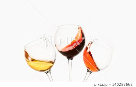 White, rose, red wine splashes, diagonal waves in glasses. 140282668