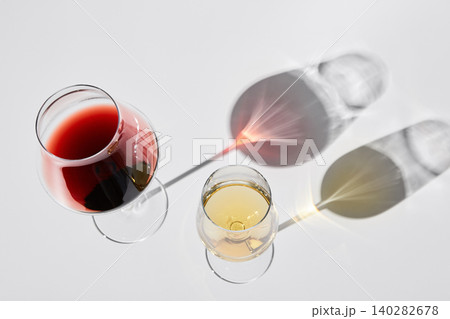 Wineglasses with red, white wine for gourmets. Wineglasses with red, white wine for gourmets. 140282678