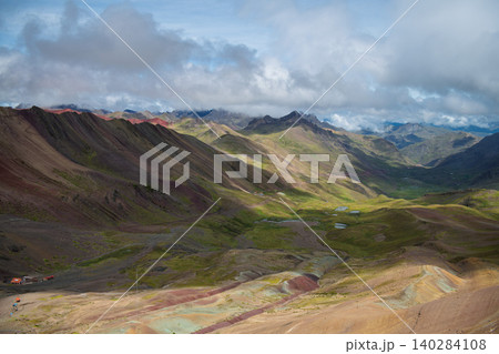Peaceful vinicunca mountain landscape with beautiful green valley 140284108