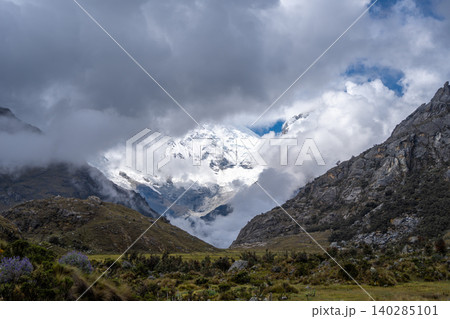 Snow-capped mountains and valley along the Laguna 69 trek in Huaraz, Peru Snow-capped mountains and valley along the Laguna 69 trek in Huaraz, Peru 140285101