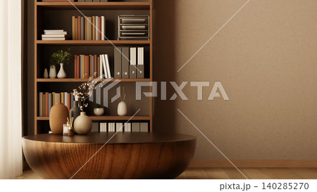 Candle and diffuser with vases on round wooden table in front of bookshelf in living room or office. Candle and diffuser with vases on round wooden table in front of bookshelf in living room or office. 140285270