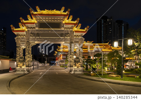 Chinese Temple Illuminated at Night in Bangkok, Thailand 140285344