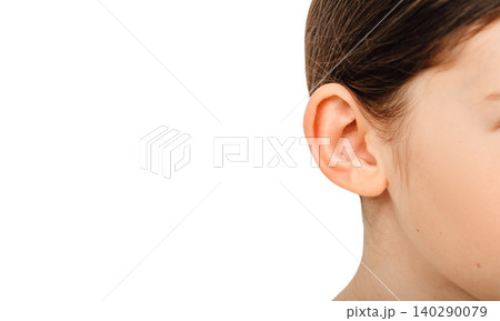 Child ear close-up isolated on a white background. Treatment and hearing test, hearing exam concept Child ear close-up isolated on a white background. Treatment and hearing test, hearing exam concept 140290079