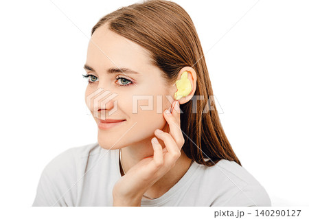 Process of making earplug from an impression of an individual s woman ear. Ear close-up. Personally molded earplugs. Part of the set Process of making earplug from an impression of an individual s woman ear. Ear close-up. Personally molded earplugs. Part of the set 140290127
