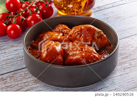Bowl of meatballs with tomato sauce and fresh cherry tomatoes on vine Bowl of meatballs with tomato sauce and fresh cherry tomatoes on vine 140290516