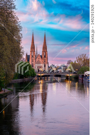 Twilight Cathedral and Canal With Cyclist on Bridge Twilight Cathedral and Canal With Cyclist on Bridge 140291926