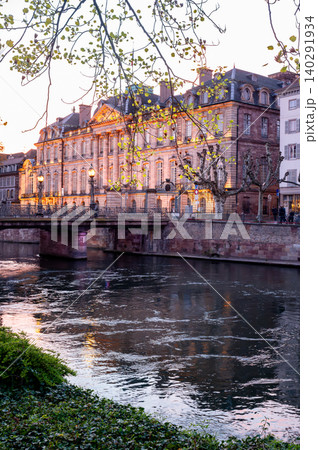 Golden Hour Glow on Limestone Facade and Arched Bridge 140291934