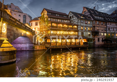 Dusk Riverside Illuminated Timbered Houses Golden Light Dusk Riverside Illuminated Timbered Houses Golden Light 140291937