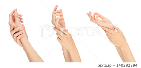 Clipping path, female hand is pointing, grasping and holding something isolated on white background. Clipping path, female hand is pointing, grasping and holding something isolated on white background. 140292294