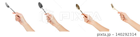 Clipping path, Collection of hands holding forks and spoons isolated on white background. Clipping path, Collection of hands holding forks and spoons isolated on white background. 140292314