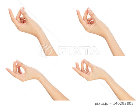 Clipping path, female hand is pointing, grasping and holding something isolated on white background. Clipping path, female hand is pointing, grasping and holding something isolated on white background. 140292803