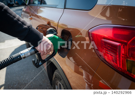Refueling Car at Gas Station Fuel Pump Refueling Car at Gas Station Fuel Pump 140292966
