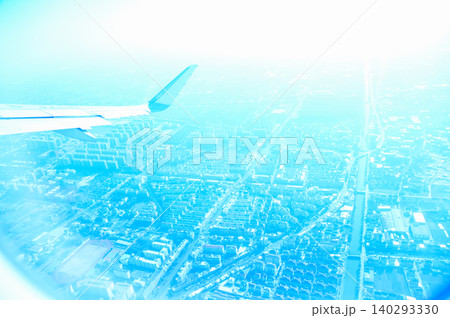 The view of China city from the airplane window. Aerial view of cityscape, the land of China, Asia. Travel and landscape scene. Travel and nature concept. The view of China city from the airplane window. Aerial view of cityscape, the land of China, Asia. Travel and landscape scene. Travel and nature concept. 140293330
