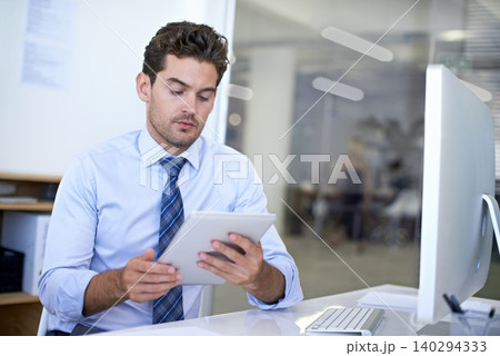 Tablet, reading and businessman in office for research on finance budget project for company. Computer, professional and male financial advisor working on account with digital technology in workplace Tablet, reading and businessman in office for research on finance budget project for company. Computer, professional and male financial advisor working on account with digital technology in workplace 140294333