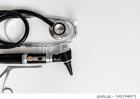 Various essential instruments for examining hearing health are arranged neatly at a modern clinic workspace with space for text. Audiology concept Various essential instruments for examining hearing health are arranged neatly at a modern clinic workspace with space for text. Audiology concept 140294671