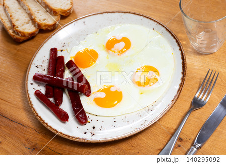 Huevos con chistorra. Scrambled eggs with sausage Huevos con chistorra. Scrambled eggs with sausage 140295092