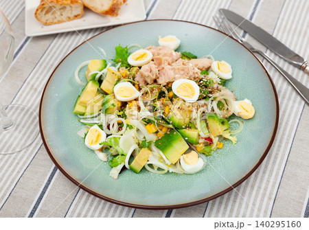 Salad with tuna, avocado, eggs, and greens for healthy dish Salad with tuna, avocado, eggs, and greens for healthy dish 140295160