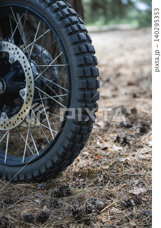 Off Road Motorcycle Wheel On Forest Trail Off Road Motorcycle Wheel On Forest Trail 140295353
