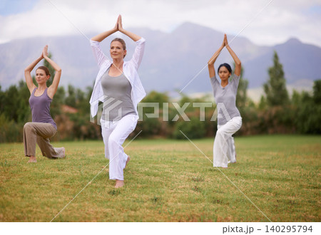 Woman, personal trainer and yoga on field for spiritual wellness, namaste or wellbeing in nature. Female person or fitness teacher for zen, balance or stretching in outdoor exercise on green grass Woman, personal trainer and yoga on field for spiritual wellness, namaste or wellbeing in nature. Female person or fitness teacher for zen, balance or stretching in outdoor exercise on green grass 140295794