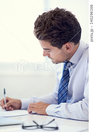 Businessman, writing notes and document for planning, office and professional workspace. Male person, company and brainstorming for client, startup and entrepreneur for career and corporate 140296166