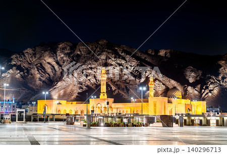 The illuminated Masjid Sayed Al Shouhada mosque stands at the base of Mount Uhud under a night sky in Madinah, Saudi Arabia. The illuminated Masjid Sayed Al Shouhada mosque stands at the base of Mount Uhud under a night sky in Madinah, Saudi Arabia. 140296713