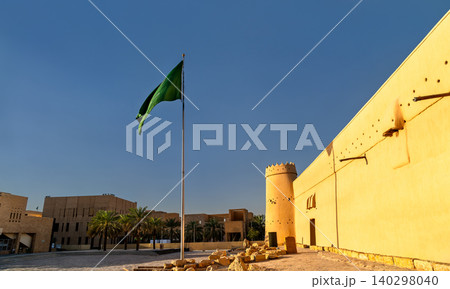 Masmak Fortress with Saudi flag in Riyadh Masmak Fortress with Saudi flag in Riyadh 140298040