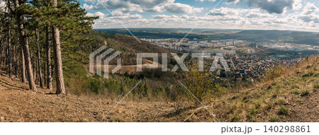Panoramic View Over Town And Forested Hills Panoramic View Over Town And Forested Hills 140298861