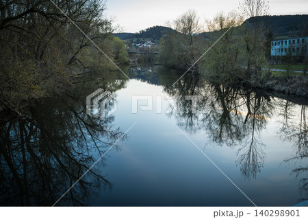 Calm River Reflection At Dusk 140298901