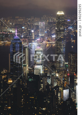 Hong Kong night evening view, China, seen from Victoria Peak observation deck, Lugard road lookout, with Hong Kong downtown skyscrapers and Kowloon island, illuminated city and Victoria Bay at night 140299295