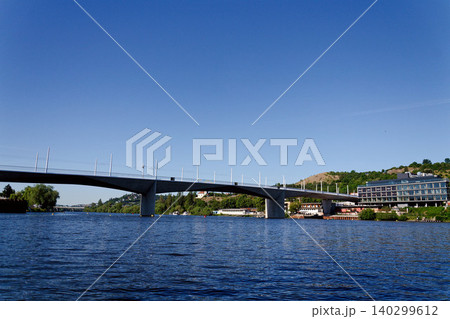 New modern Dvorecky Bridge spanning the Vltava River connecting Smichov and Podoli, designed exclusively for public transport, pedestrians and cyclists, Prague, Czech Republic 140299612