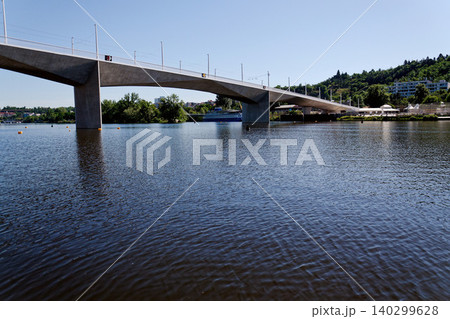 New modern Dvorecky Bridge spanning the Vltava River connecting Smichov and Podoli, designed exclusively for public transport, pedestrians and cyclists, Prague, Czech Republic New modern Dvorecky Bridge spanning the Vltava River connecting Smichov and Podoli, designed exclusively for public transport, pedestrians and cyclists, Prague, Czech Republic 140299628