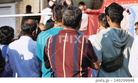 Devotees celebrating Ganesh Chaturthi festival, crowd gathering for Hindu event Devotees celebrating Ganesh Chaturthi festival, crowd gathering for Hindu event 140299946
