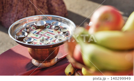 Hindu puja thali with swastika symbol and offerings during Ganesha festival in India Hindu puja thali with swastika symbol and offerings during Ganesha festival in India 140299949