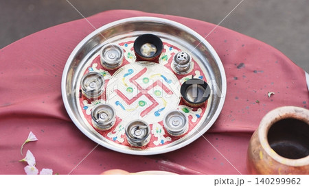 Ganesh Chaturthi puja thali with swastika symbol during Hindu religious ceremony Ganesh Chaturthi puja thali with swastika symbol during Hindu religious ceremony 140299962