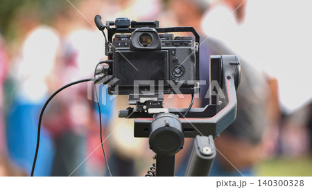 Professional video camera on gimbal rig filming live events at India Day festival, Moscow Professional video camera on gimbal rig filming live events at India Day festival, Moscow 140300328