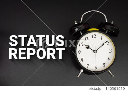 Status Report text with alarm clock on black background 140301030