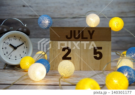 Wooden Calendar Showing the Date of July 25th. Day 25 of July month Wooden Calendar Showing the Date of July 25th. Day 25 of July month 140301177