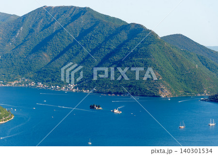 Yachts with tourists sailing on Bay of Kotor in Montenegro, summer landscape Yachts with tourists sailing on Bay of Kotor in Montenegro, summer landscape 140301534