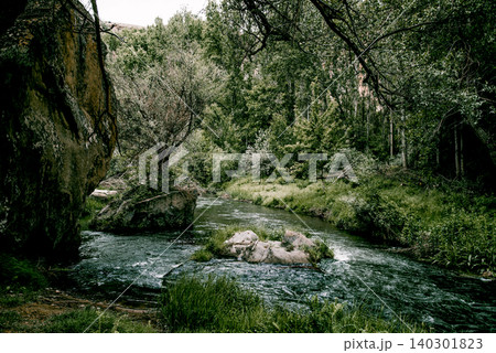 Melendiz River flowing in Ihlara Valley in Cappadocia Turkey, summer landscape Melendiz River flowing in Ihlara Valley in Cappadocia Turkey, summer landscape 140301823
