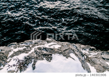 Krasnoyarsk Reservoir on Yenisei River, winter landscape on cloudy day Siberia 140301906